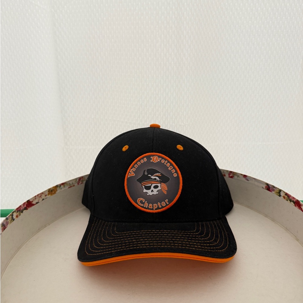 Black and Orange Cap with Skull Logo